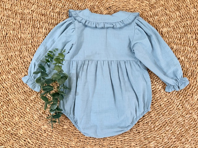 Light blue romper with ruffled collar